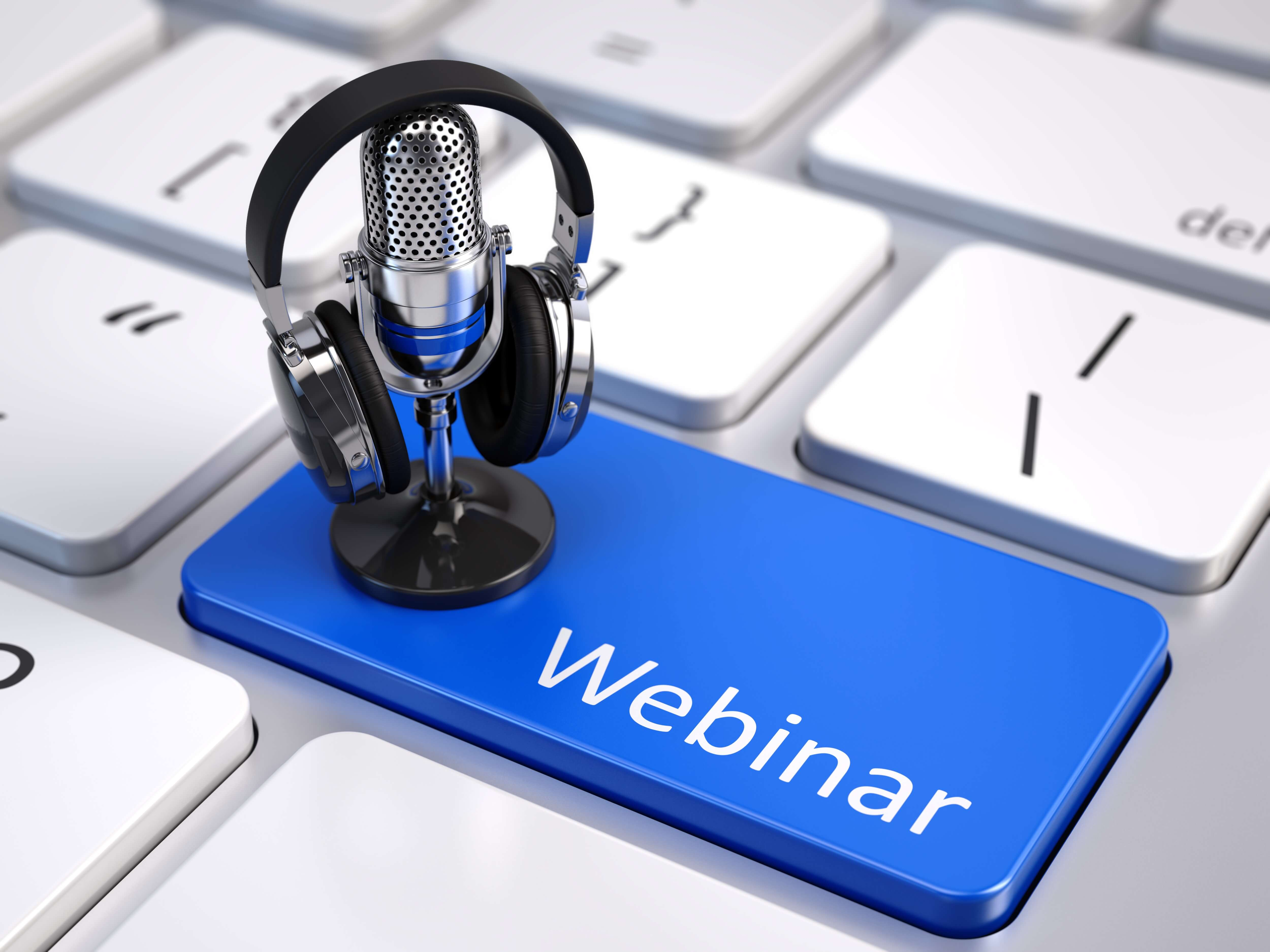 Microphone and headphones on a Webinar keyboard key