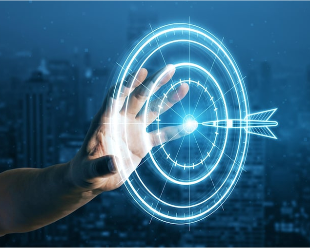 Hand reaching toward a glowing target